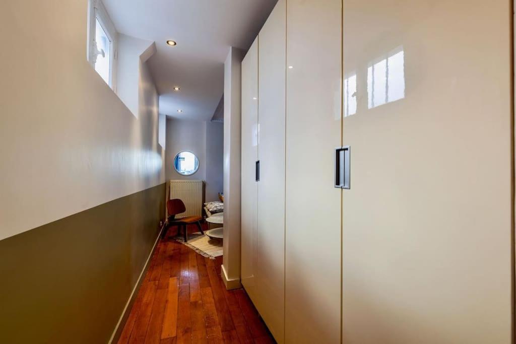 Charmant Appartement Au Coeur De パリ エクステリア 写真