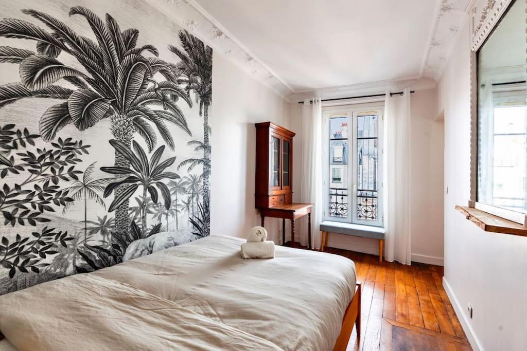 Charmant Appartement Au Coeur De パリ エクステリア 写真